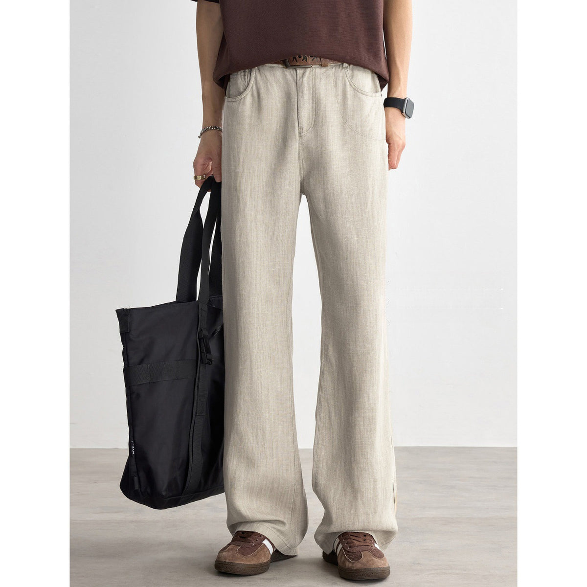 Khaki straight-leg linen blend pants, side view with belt loops and front pockets