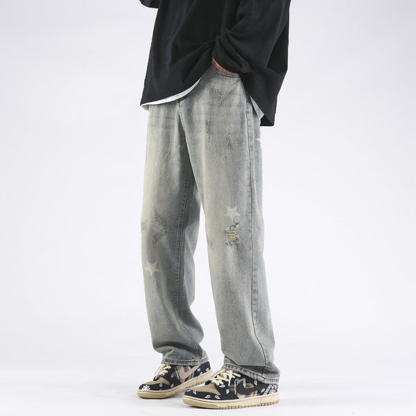 XINGX Printed Yellow Mud Dyed Ripped Jeans For Men - WOMONA.COM