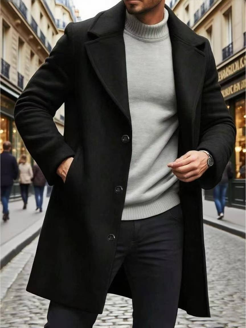 Men's black overcoat with notched lapel, button front, and side pockets
