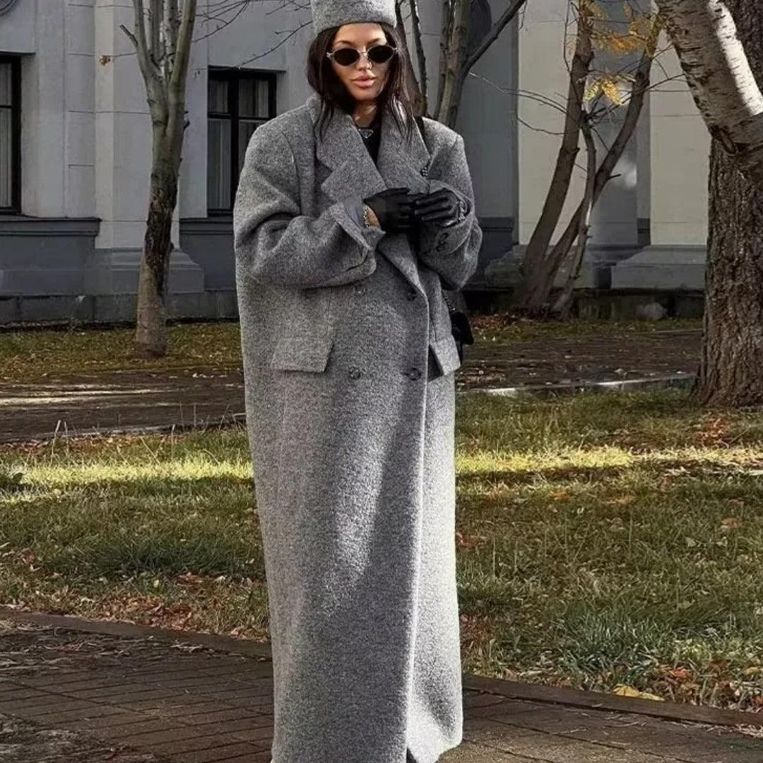 Women’s long wool coat, gray, double-breasted buttons and wide lapels, front view
