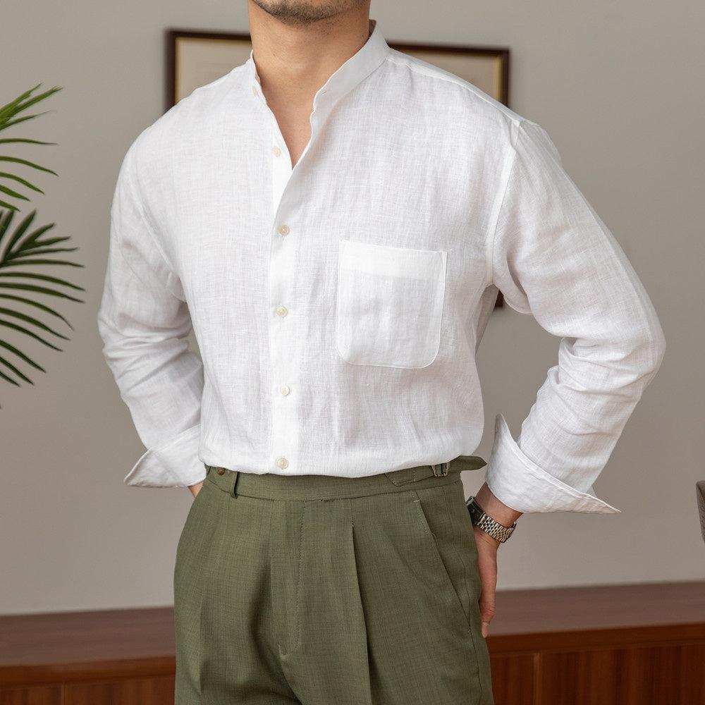 Men's white linen button-up shirt with chest pocket and long sleeves