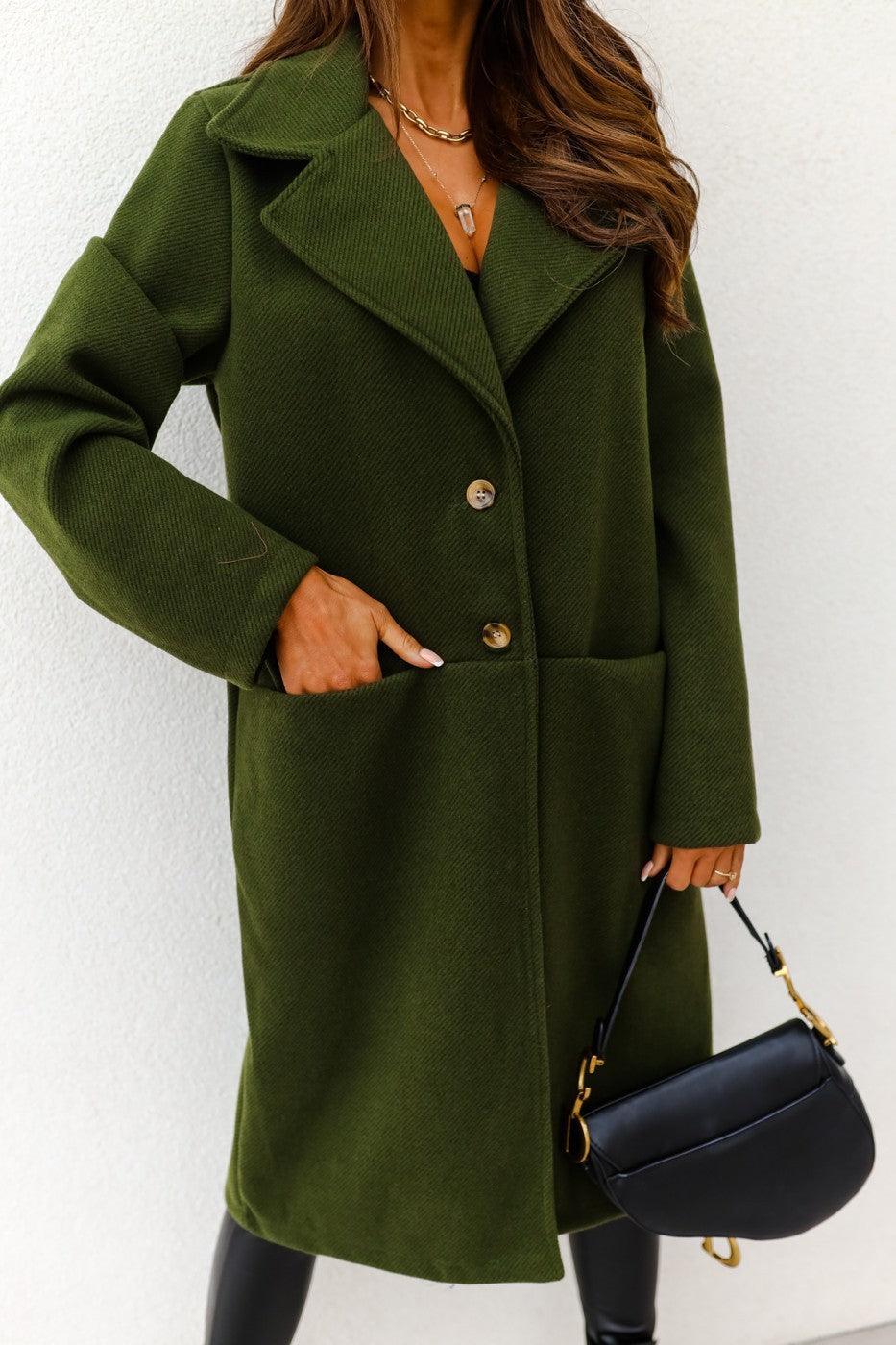 Green long wool coat with notch lapels, button front, and flap double pockets