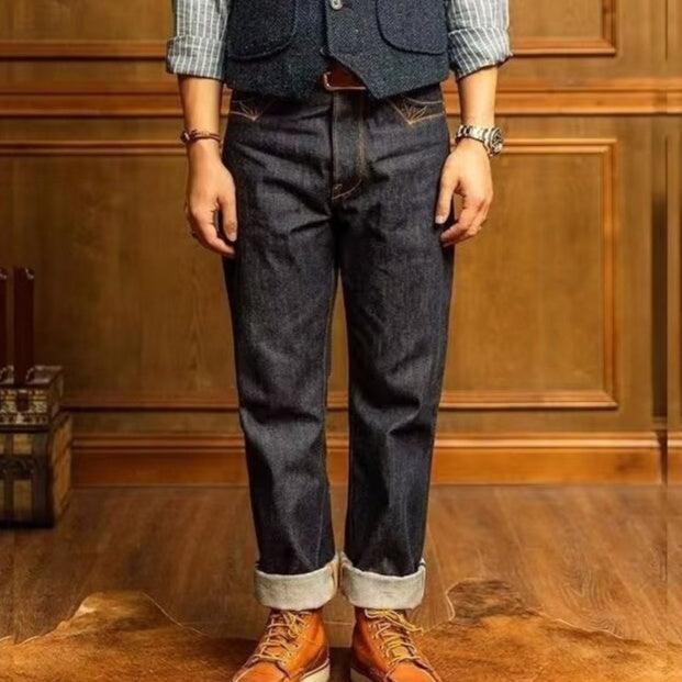 Men's straight fit denim jeans, dark blue wash with rolled cuffs and five-pocket styling