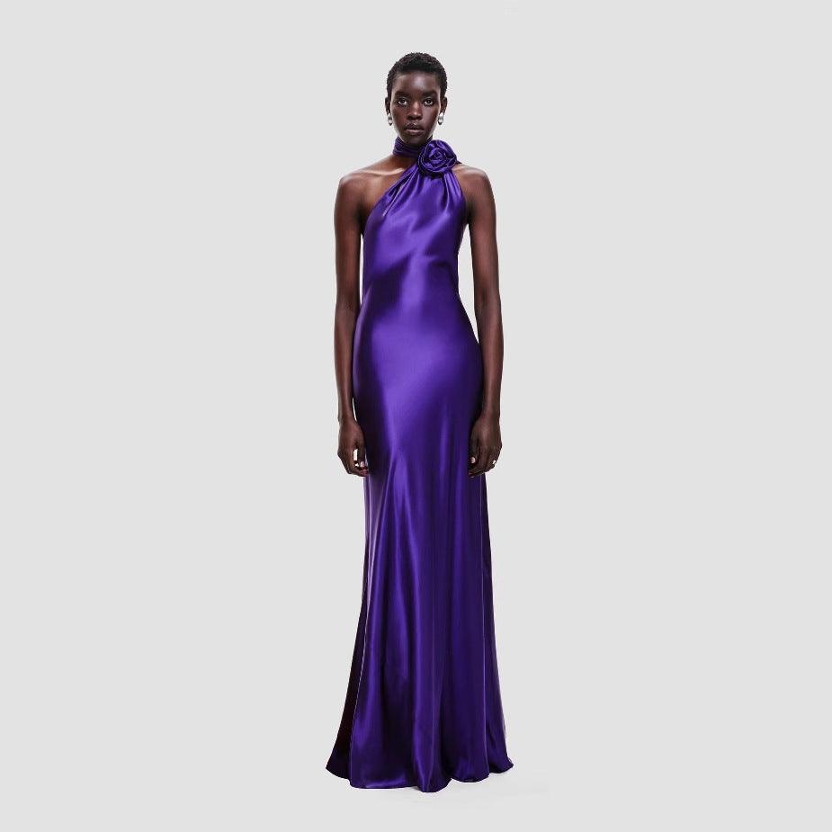 Purple satin fitted high-waist evening dress with halter neckline and neck bow, side slit