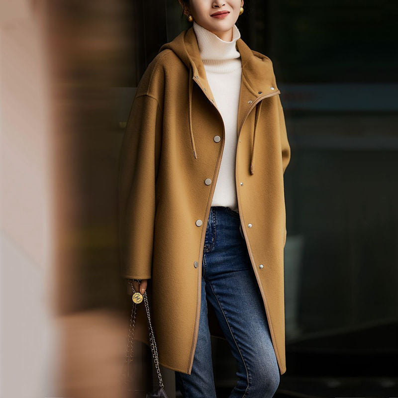 Camel hooded wool coat with button front and long sleeves.