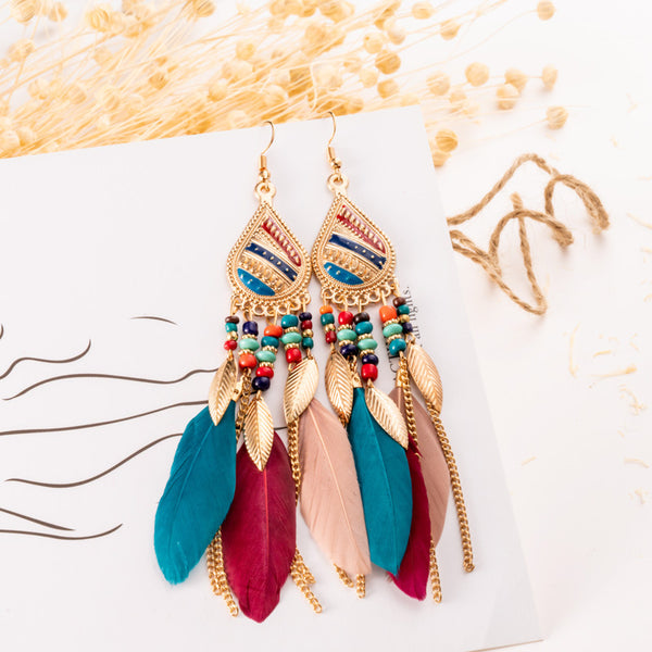 Feather and pearl earrings - WOMONA.COM