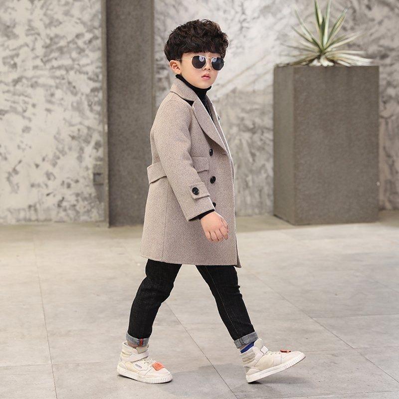 Kids' heather gray wool coat with black buttons and stand collar, full-length side view