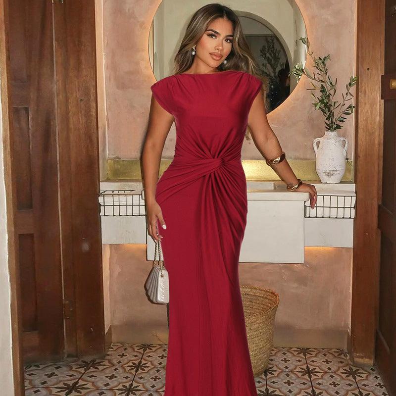 Red sleeveless slim-fit maxi dress with pleated knot at waist and back slit