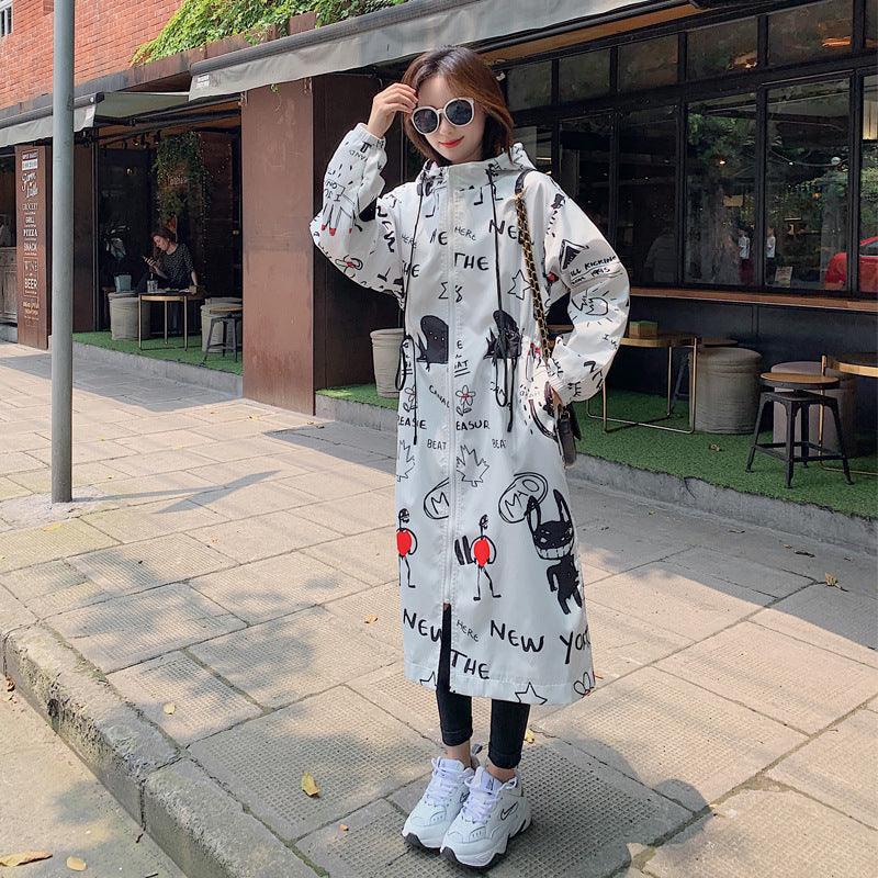 White over-the-knee loose jacket with hood, full-zip, and black graphic print