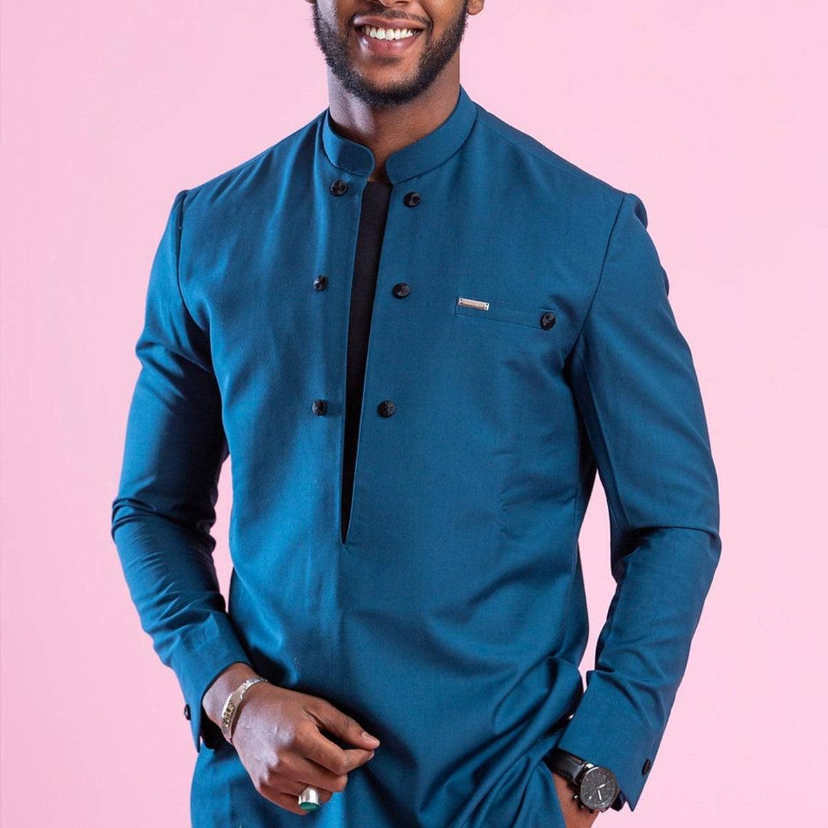 Blue long-sleeve jacket suit with stand collar and dark button detailing