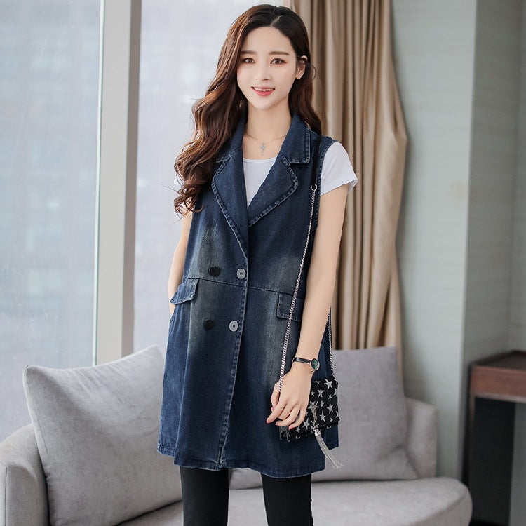 Denim vest coat with dark blue sleeveless design, double-breasted buttons, and front pockets
