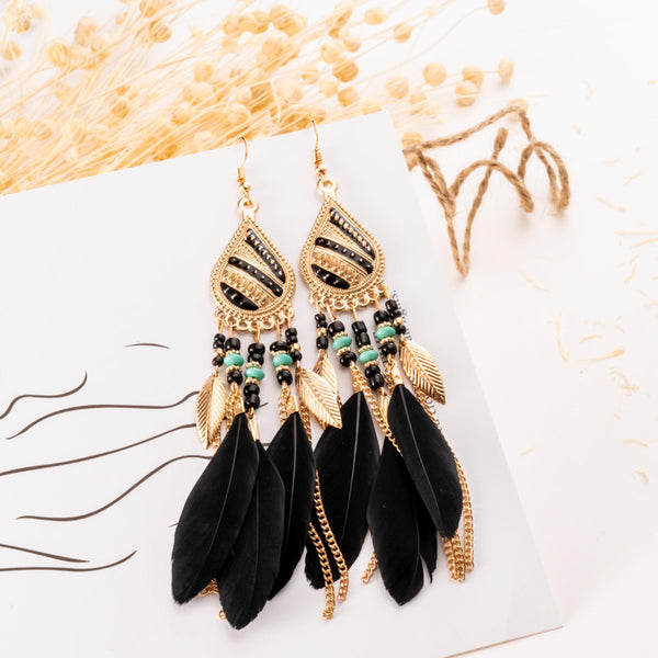 Feather and pearl earrings - WOMONA.COM