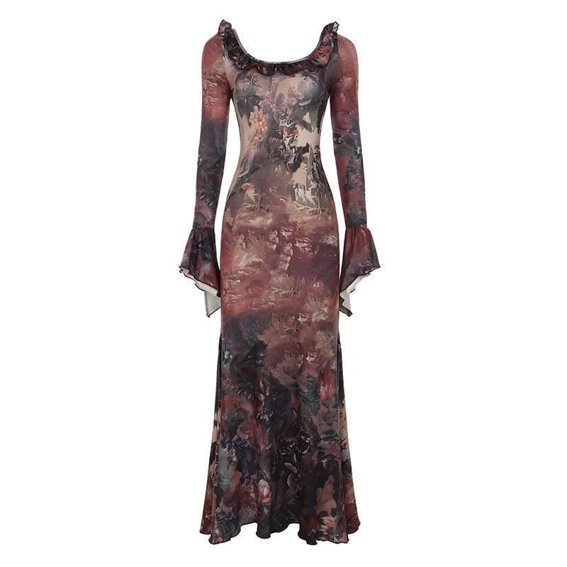 Full-length floral column dress with long sleeves, round ruffle neckline, maxi hem.