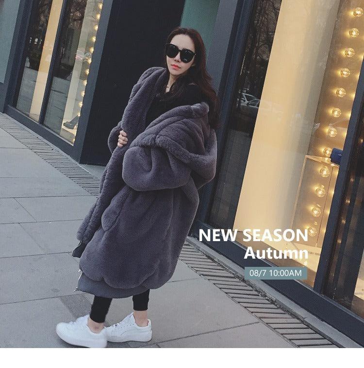 Women’s hooded fur jacket in dark charcoal gray, thick plush pile with front zipper
