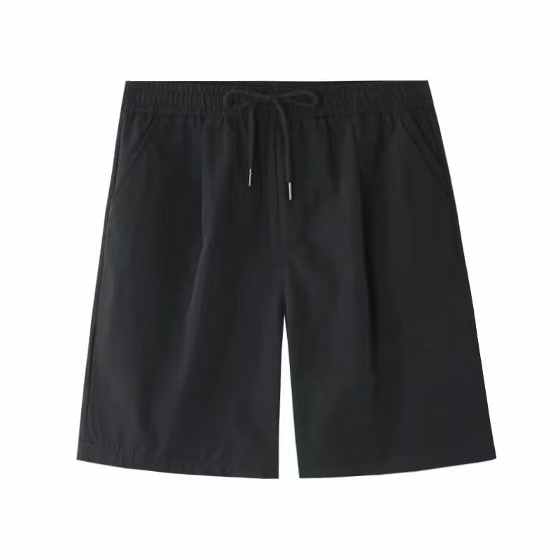 Black drawstring sports shorts with elastic waistband