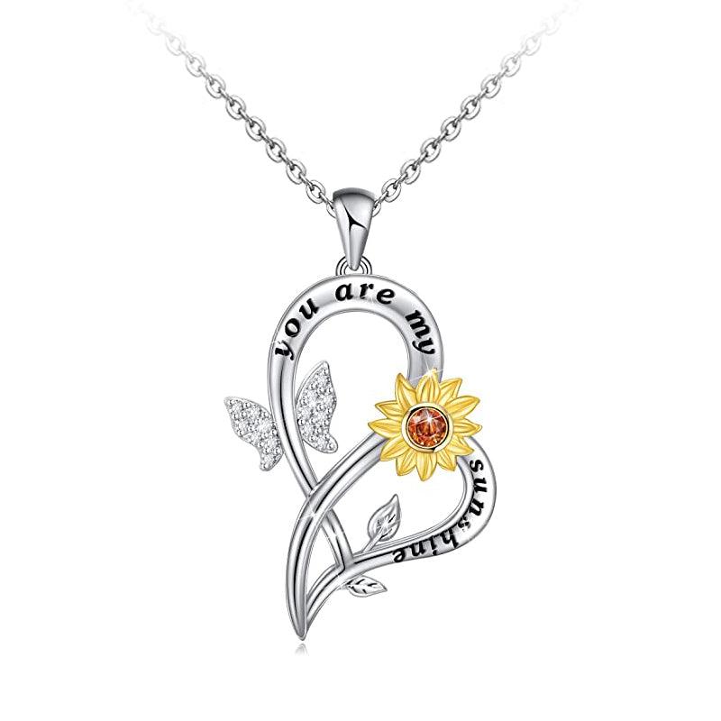 Sunflower heart locket pendant necklace, silver-tone chain with butterfly and leaf charms