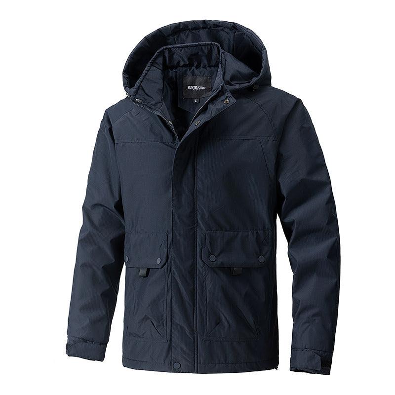 Dark blue hooded winter jacket with zip front, snap placket, and flap pockets