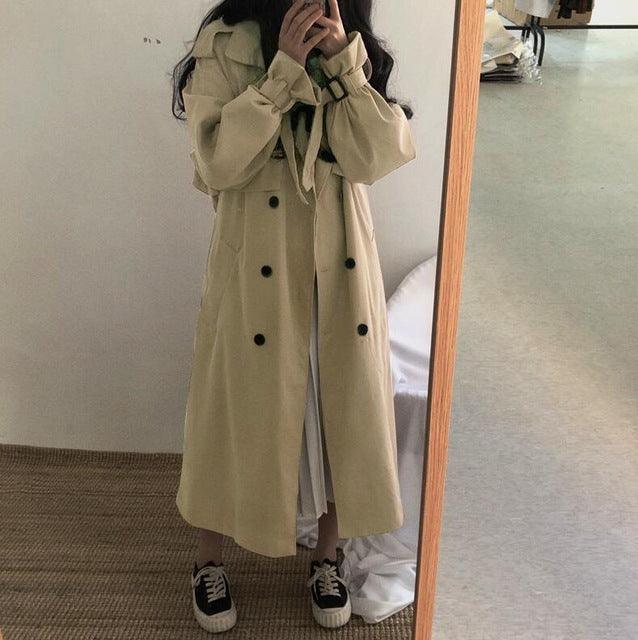 Women’s light khaki long windbreaker with hood, button front, and belt