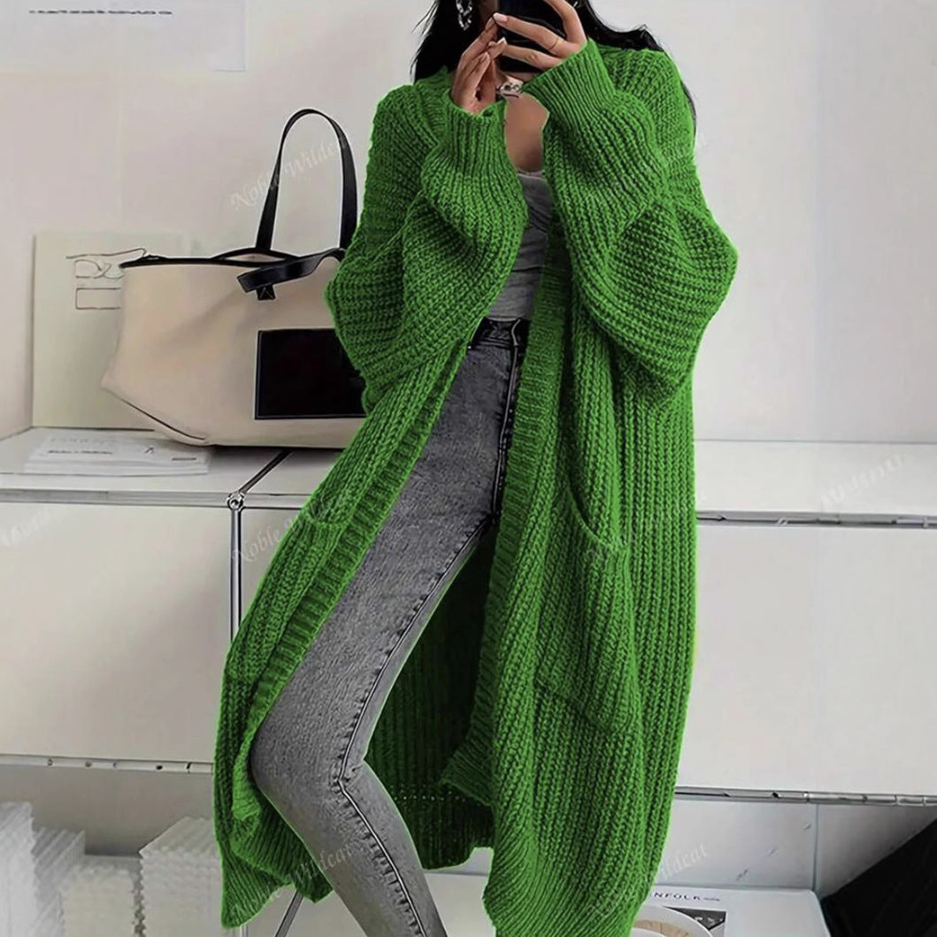 Long loose thick knit coat in green, ribbed texture, open front