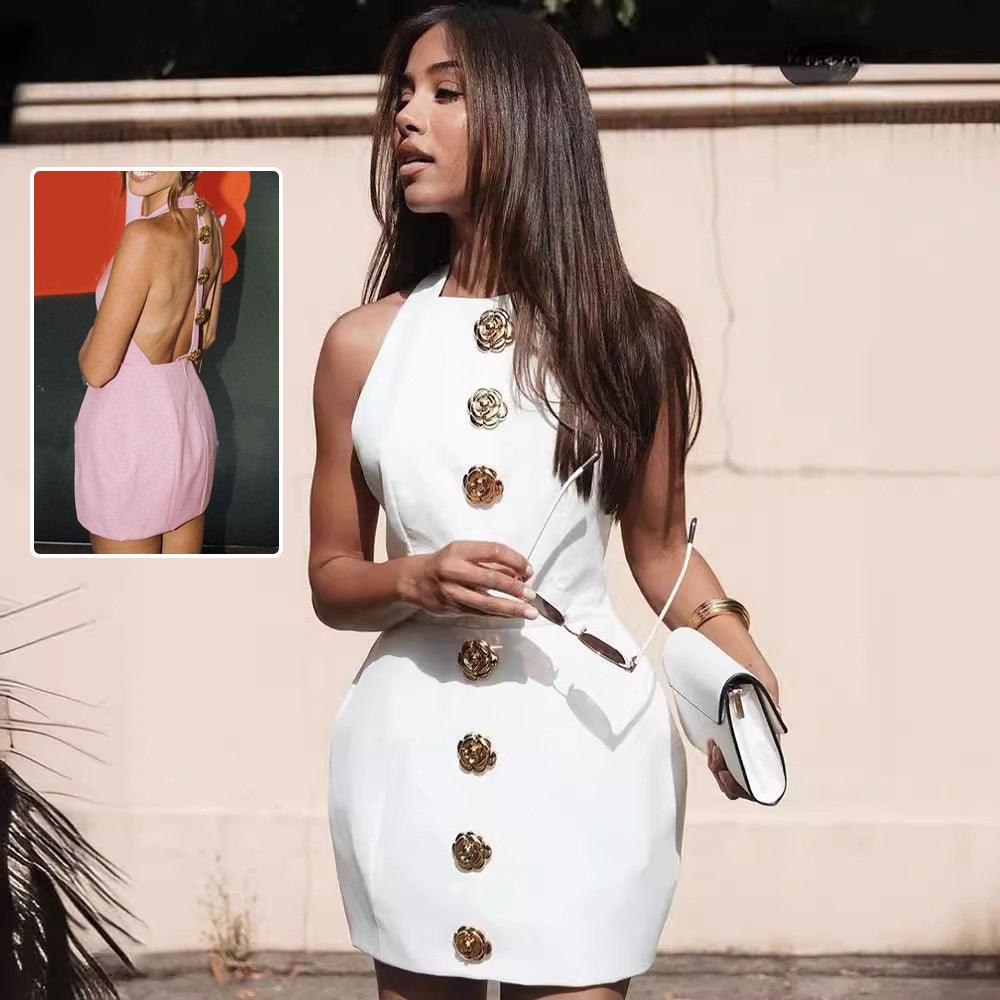 White sleeveless backless dress with gold rose-style button details