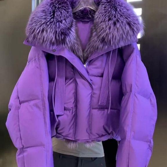 Purple short puffer coat with plush fur hood trim, front zip, and snap pockets