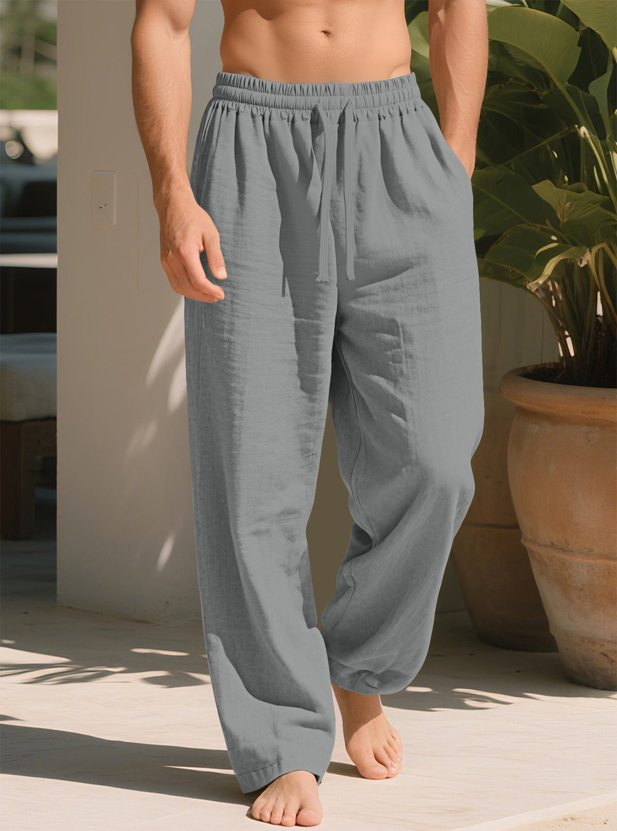 Gray plus size loose straight trousers with elastic waistband and drawstring