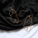 Exaggerated twisted body earrings - WOMONA.COM