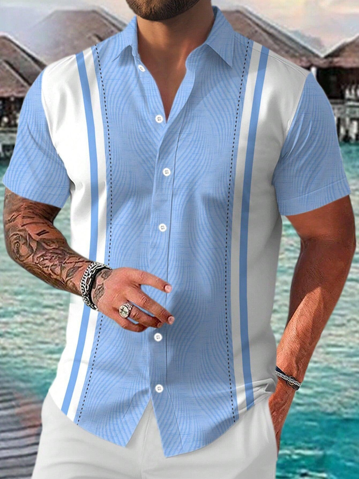 Blue short-sleeve button-up shirt with vertical stripe panels and subtle textured fabric.