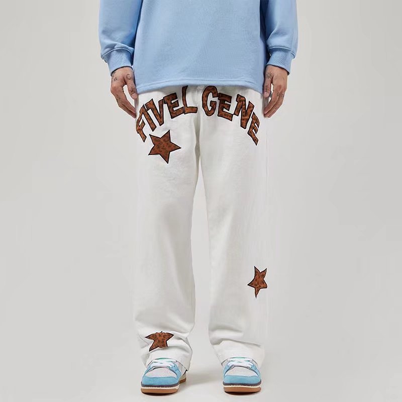 White casual workwear pants with brown "FIVEL GEN" embroidered text and star