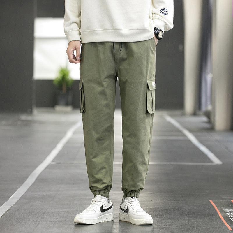 Men's olive cargo jogger pants with side cargo pockets and cuffed elastic ankles