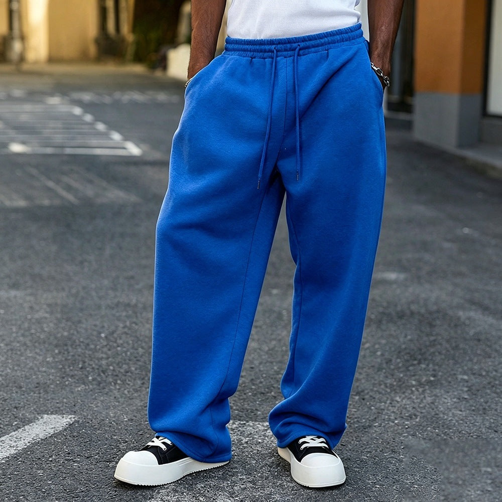 Fleece-lined loose sweatpants with elastic drawstring waistband, bright blue, relaxed straight legs
