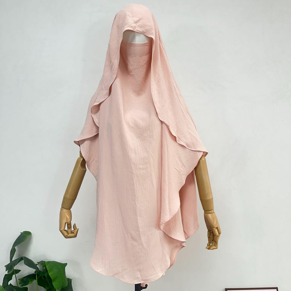 Women’s draped scarf shawl cover with hooded neckline, pale pink shade