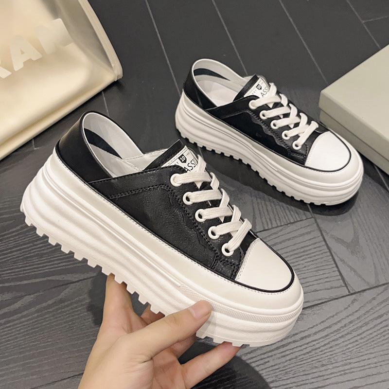 Platform low-top lace-up shoes, black leather with off-white chunky sole