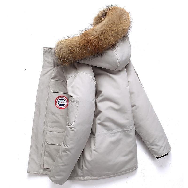 Men's mid-length winter parka with tan faux fur hood, light gray front zip and pockets