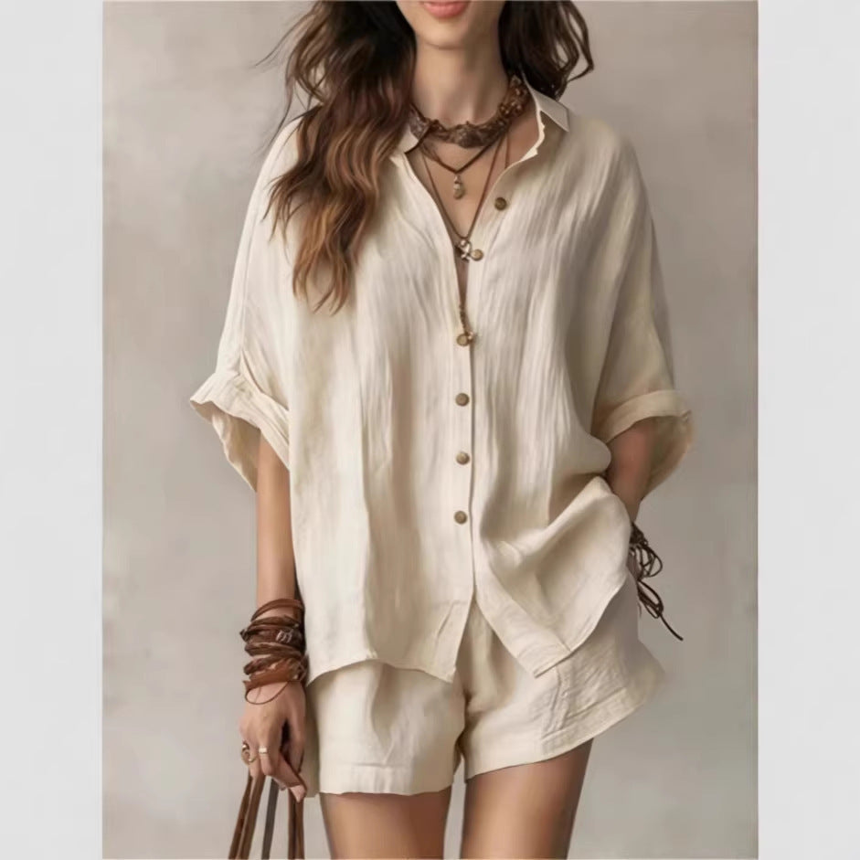 Women’s off-white button-front short-set with short sleeves and matching elastic-waist shorts