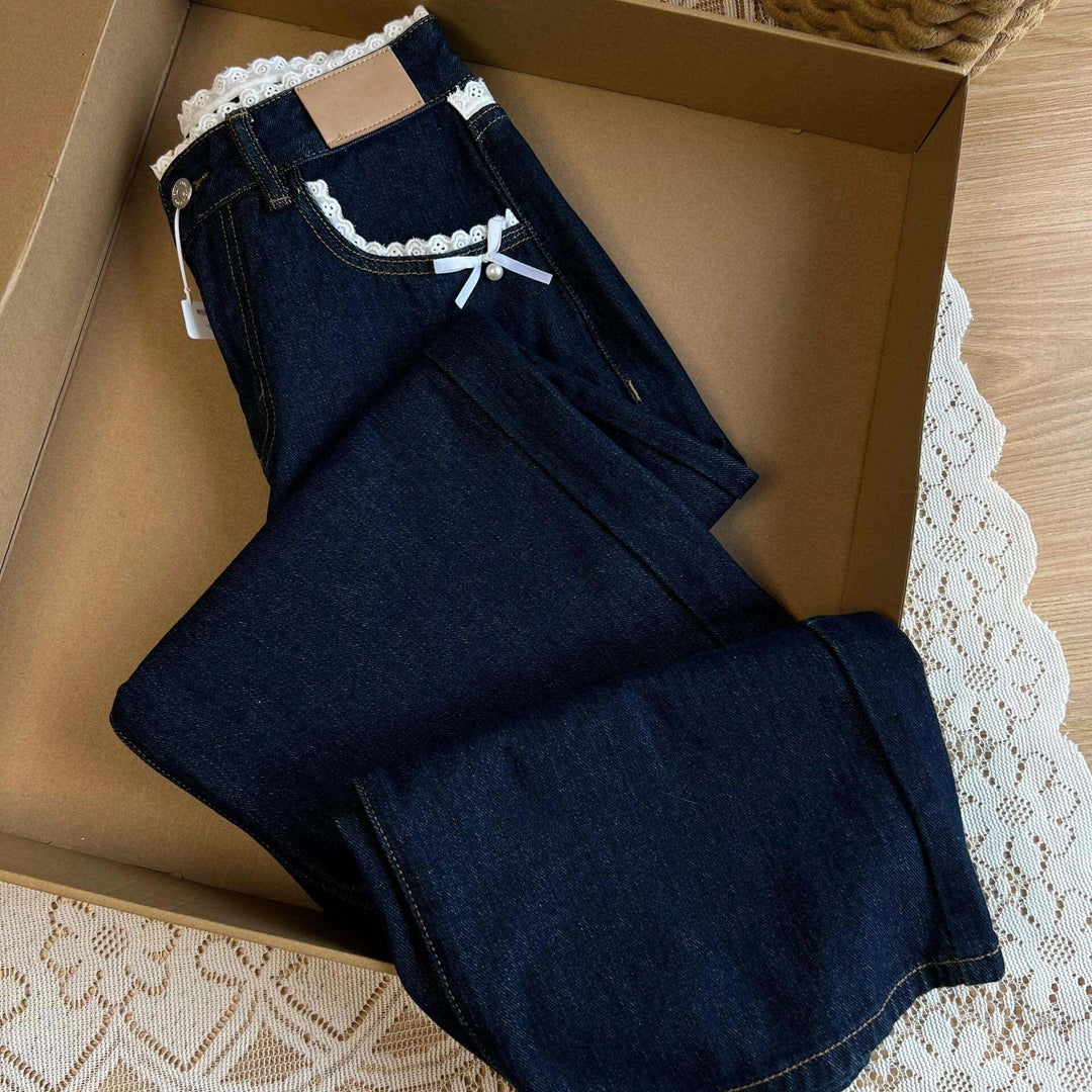 Women’s retro blue denim jeans with lace waistband and bow at the waist