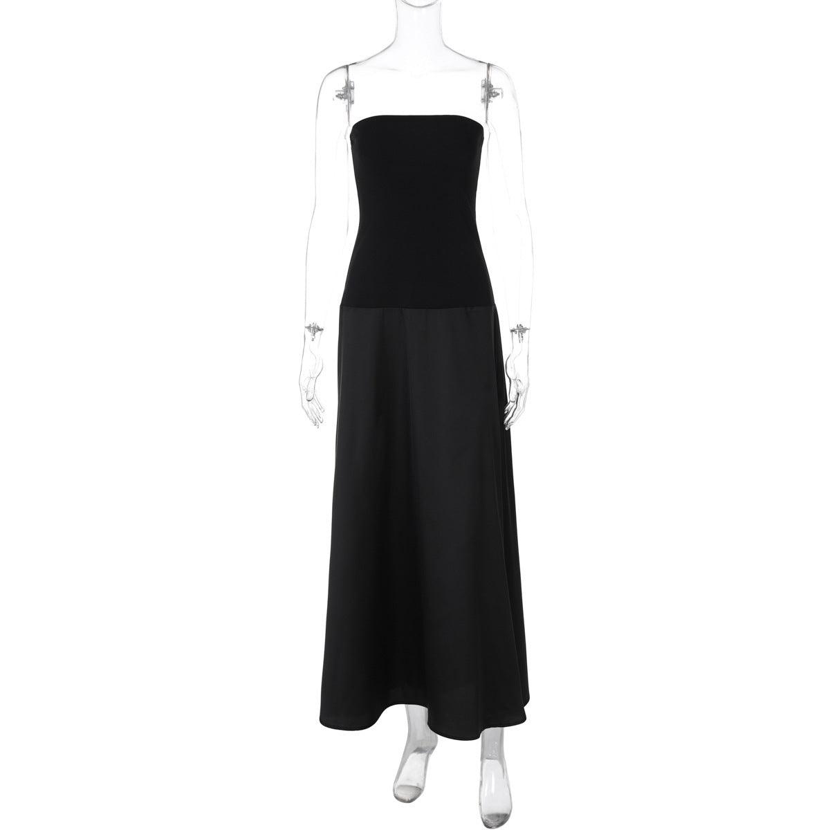 Black bandeau maxi dress on mannequin, strapless fitted bodice with full skirt