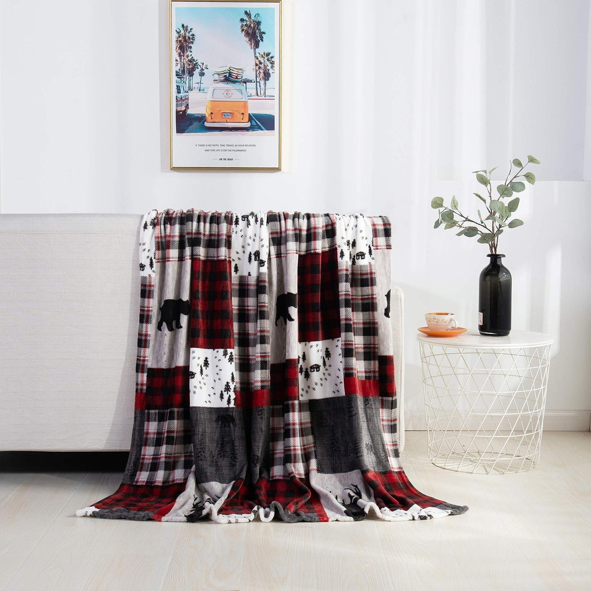 Christmas blanket with red-and-black plaid sections and snowman silhouettes