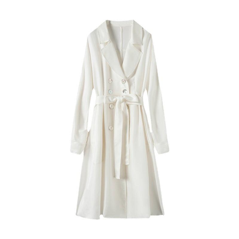White belted mid-length trench coat with notch lapels and button front