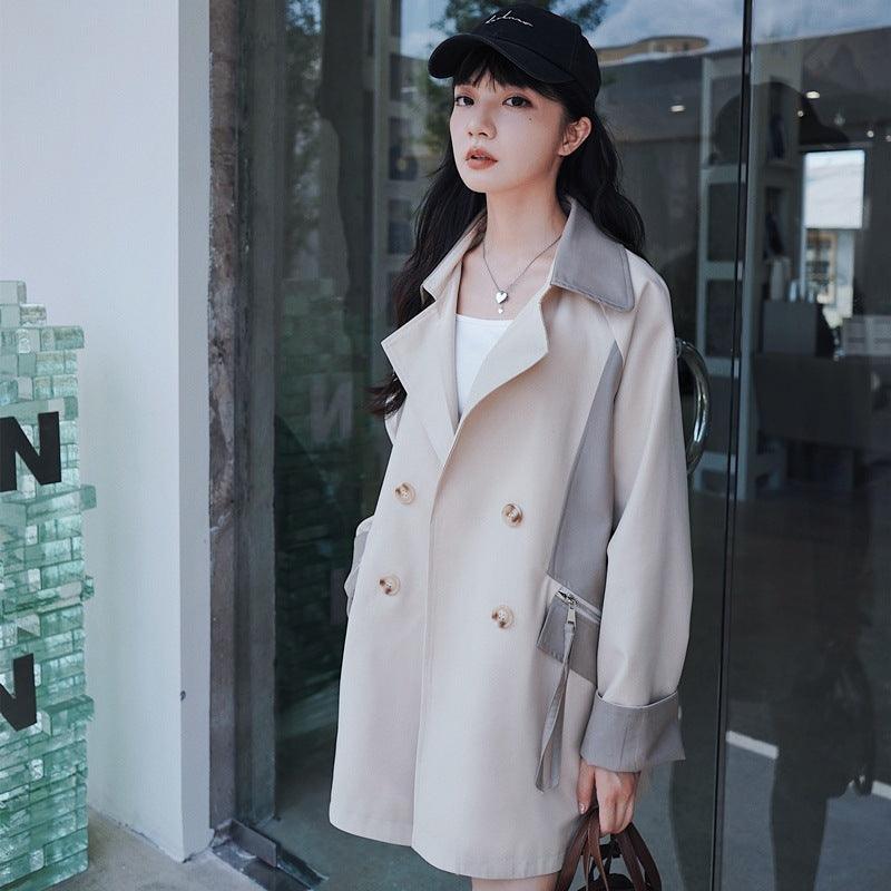 Beige short trench coat with notch lapels, double-breasted button front, flap pockets, long sleeves