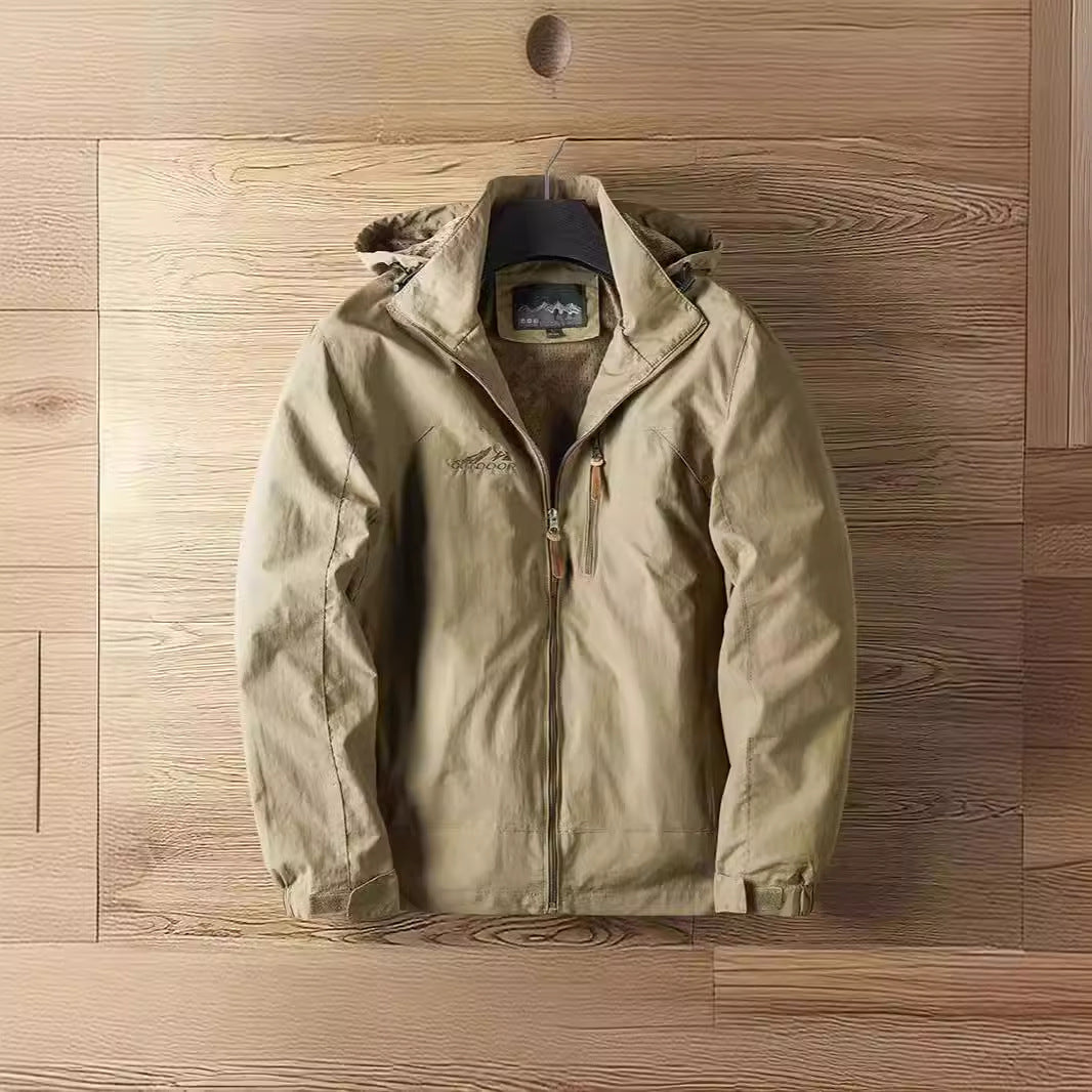 Windproof outdoor jacket in light khaki with full zip and hood.