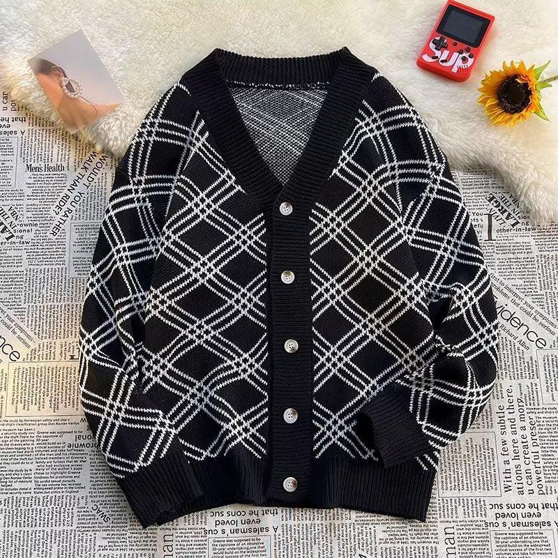 Men's black plaid knit sweater with V-neck and button-front, ribbed cuffs and hem