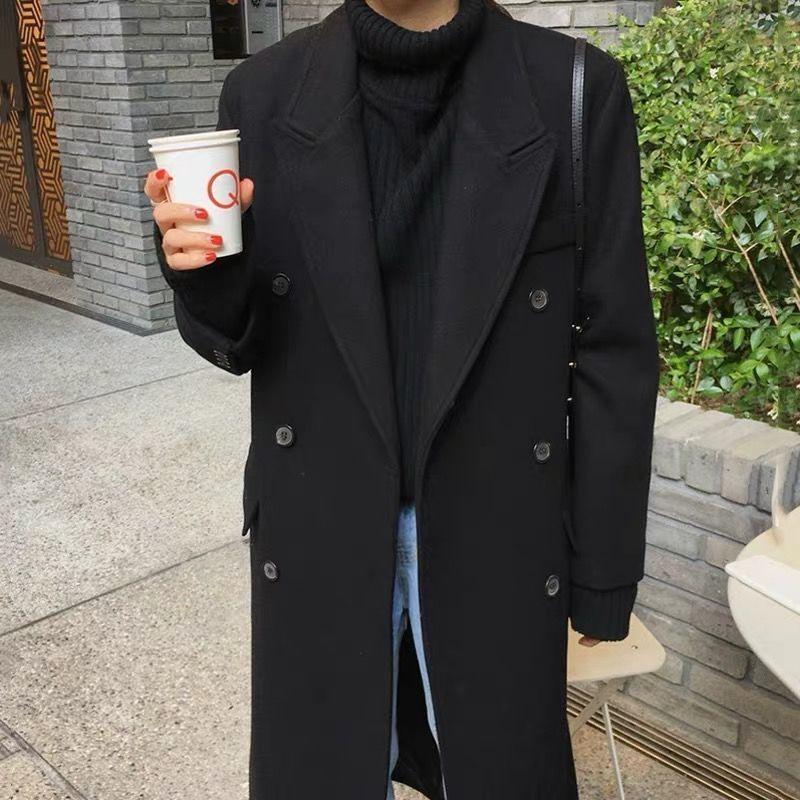 Women's black wool coat, long double-breasted with stand collar and buttoned flap pockets