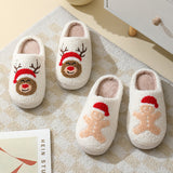 Zapatillas de casa navideñas con bonitos dibujos de Papá Noel, zapatillas de algodón para mujeres y hombres, zapatos cálidos y peludos para invierno