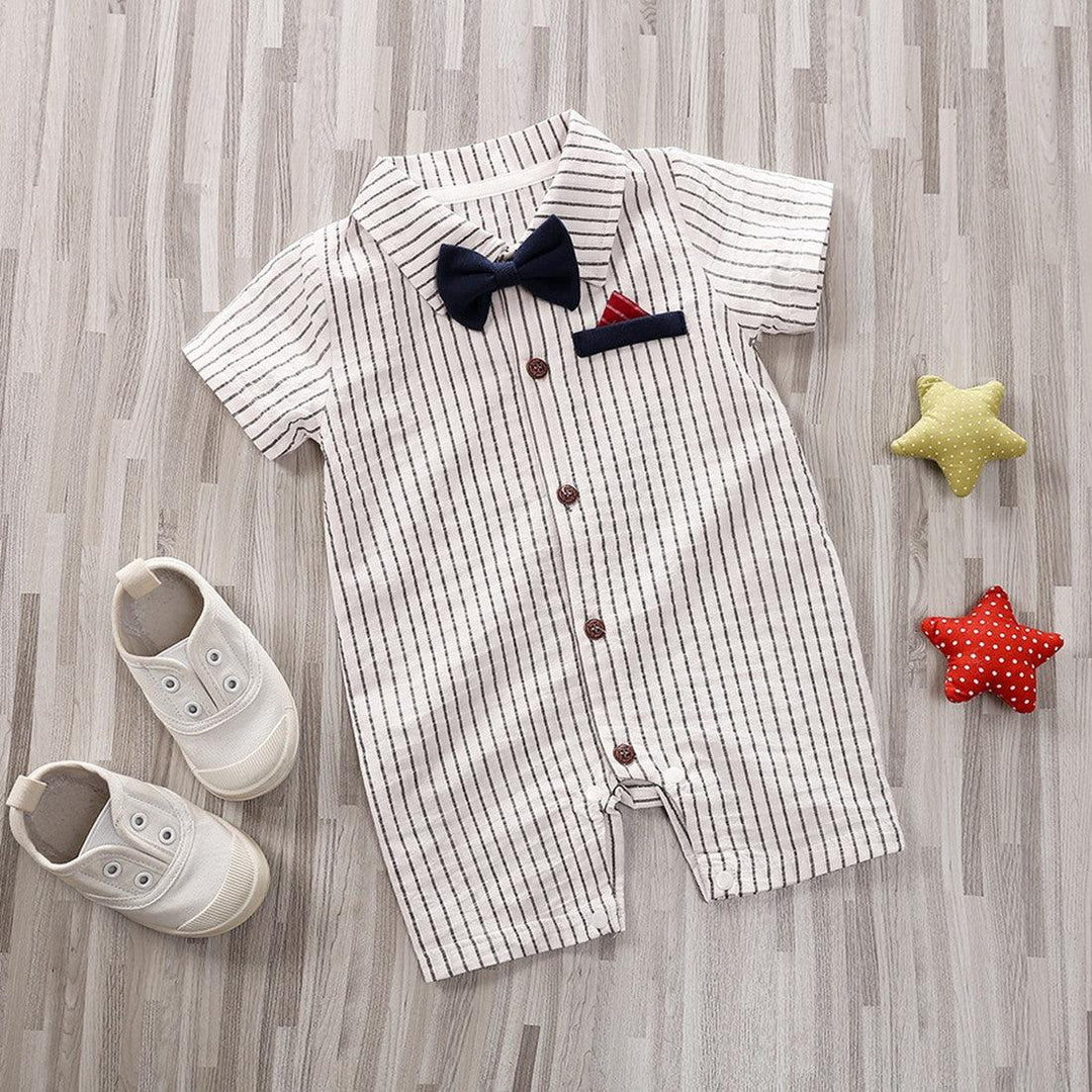 Baby onesie romper in white with dark pinstripes, button front and black bow
