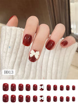 Finished Nail Manicure With Bow Knot Wearing Nails - WOMONA.COM