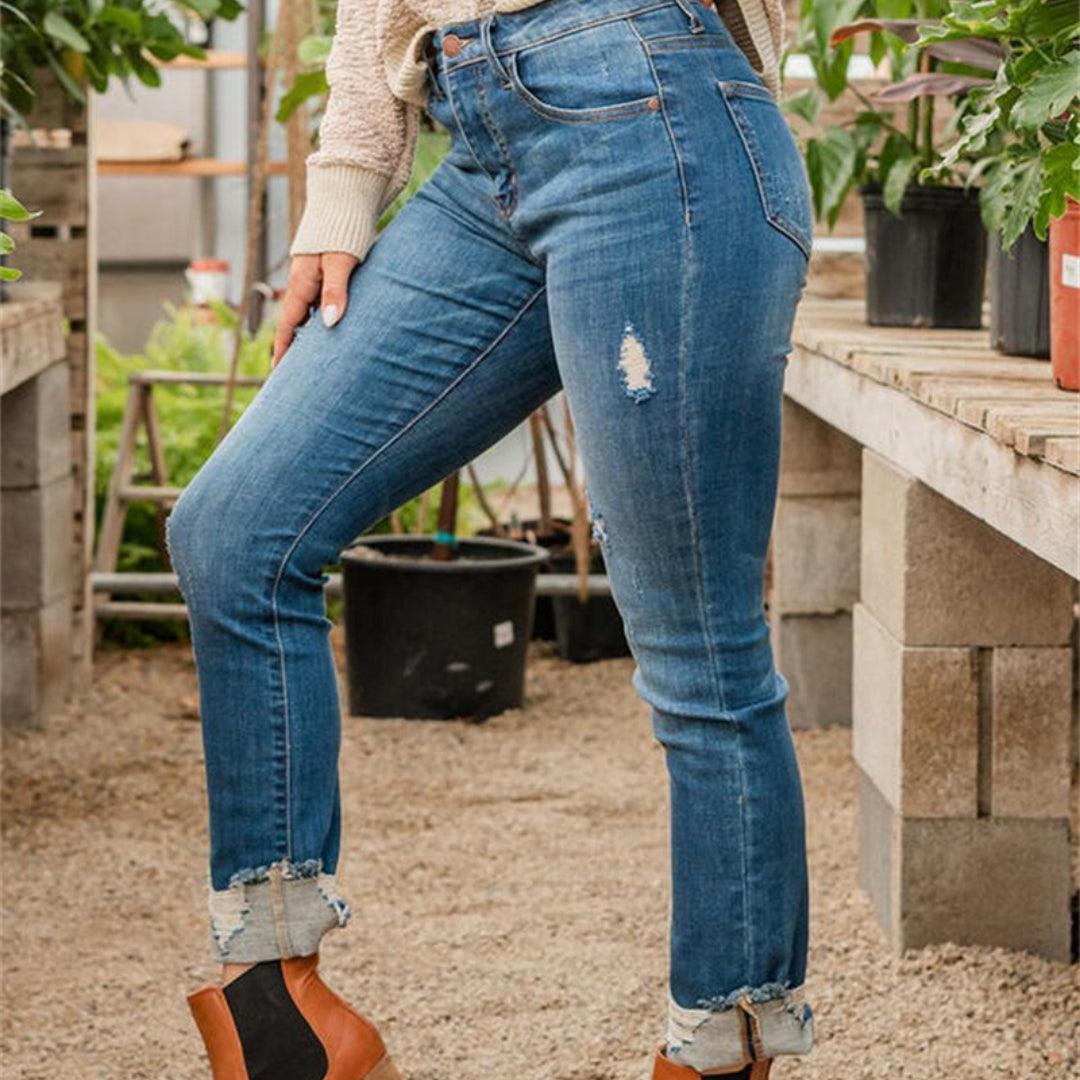 Slim Fit And Torn Blue Jeans For Women - WOMONA.COM