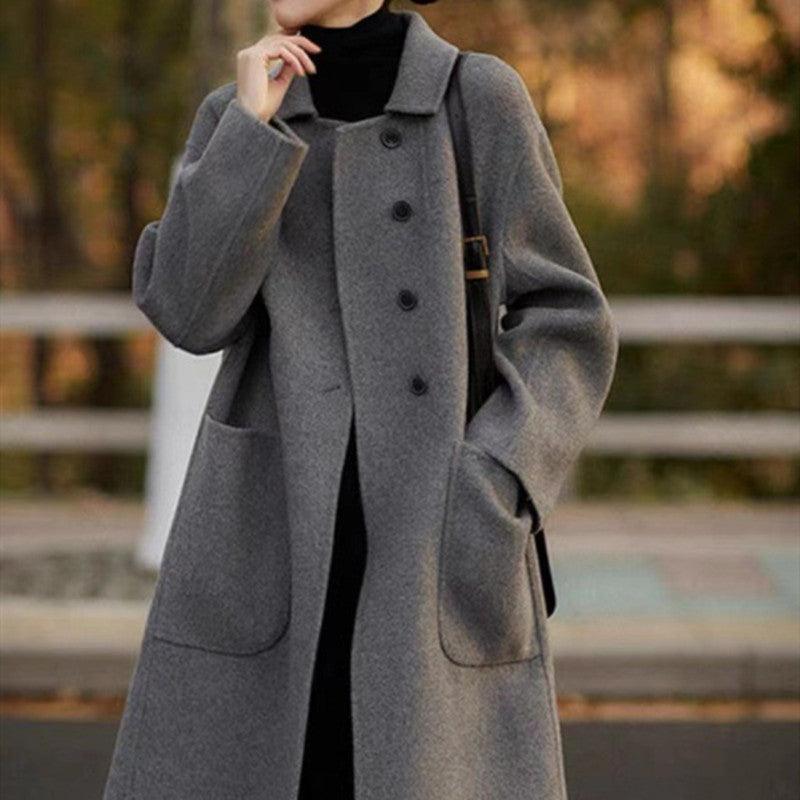 Women’s mid-length winter coat, gray, button-front, wide lapel, flap patch pockets