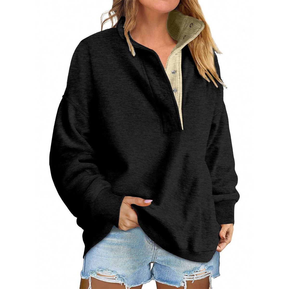 Women’s black loose pullover sweater with drawstring hood and half-button placket, front pocket