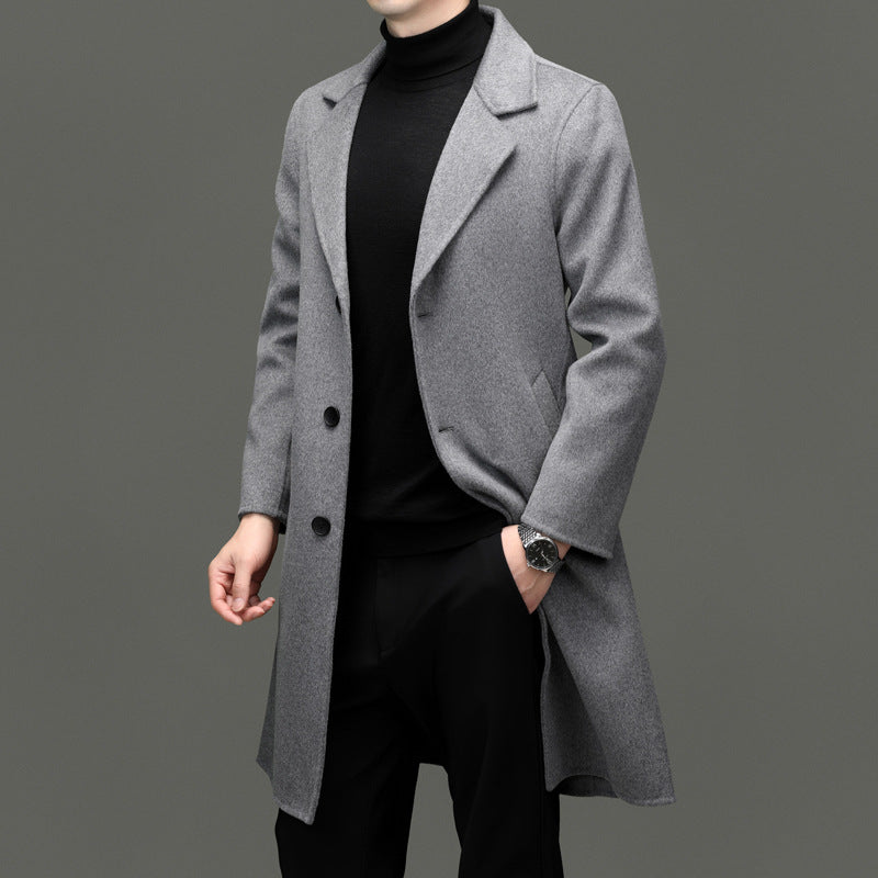 Gray long wool coat with notch lapels, button front, and side pockets